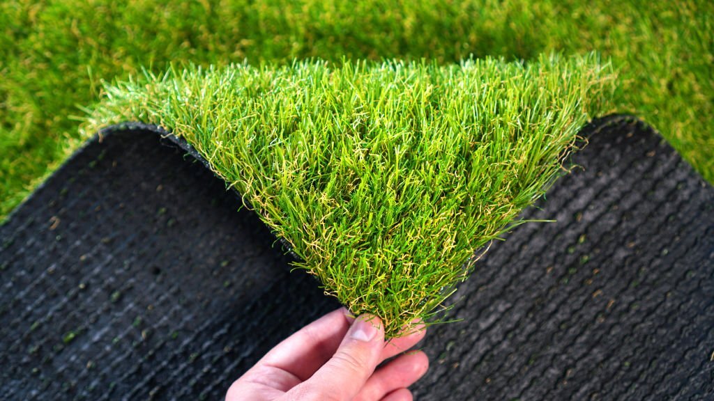 how-is-synthetic-grass-application-made-in-football-fields